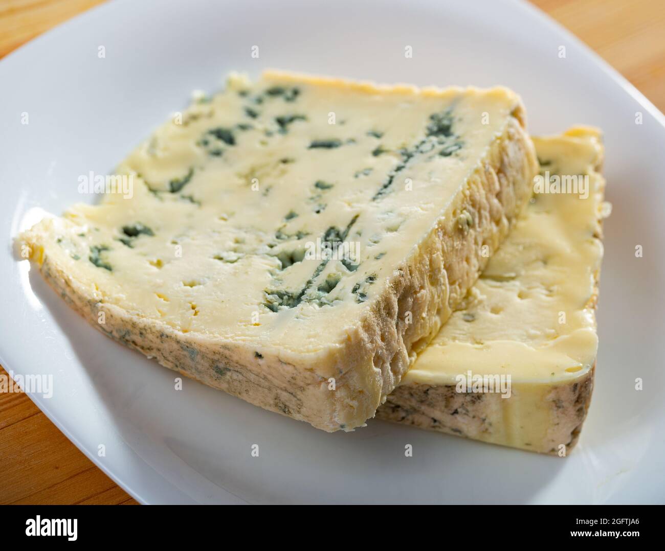Blue cheese on plate Stock Photo