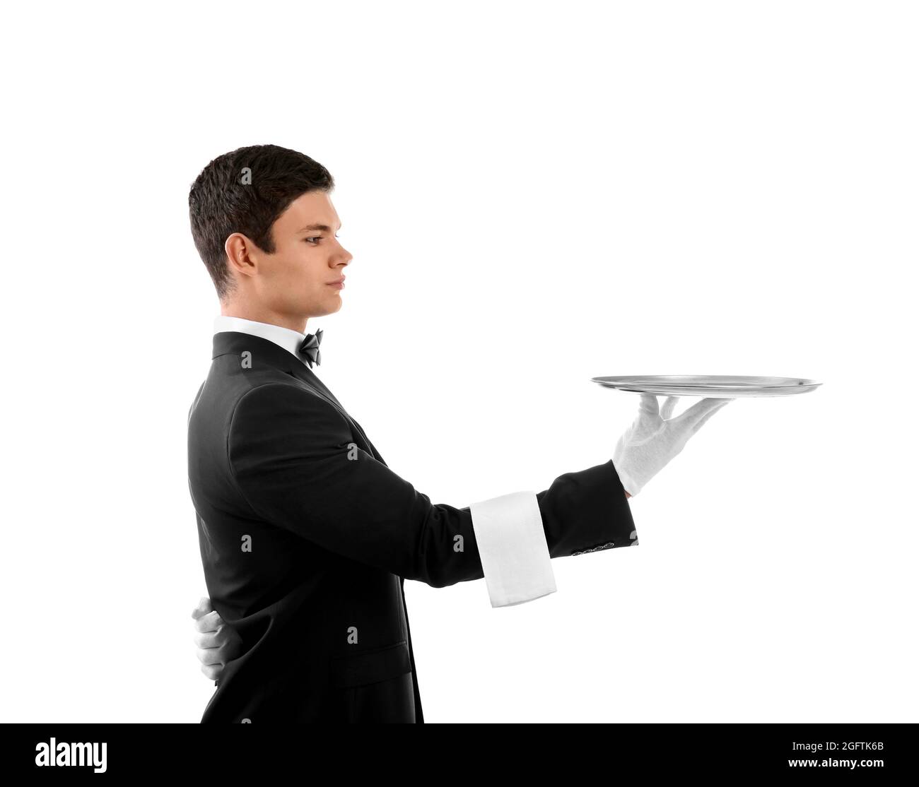 Male waiter holding tray on white background Stock Photo Alamy