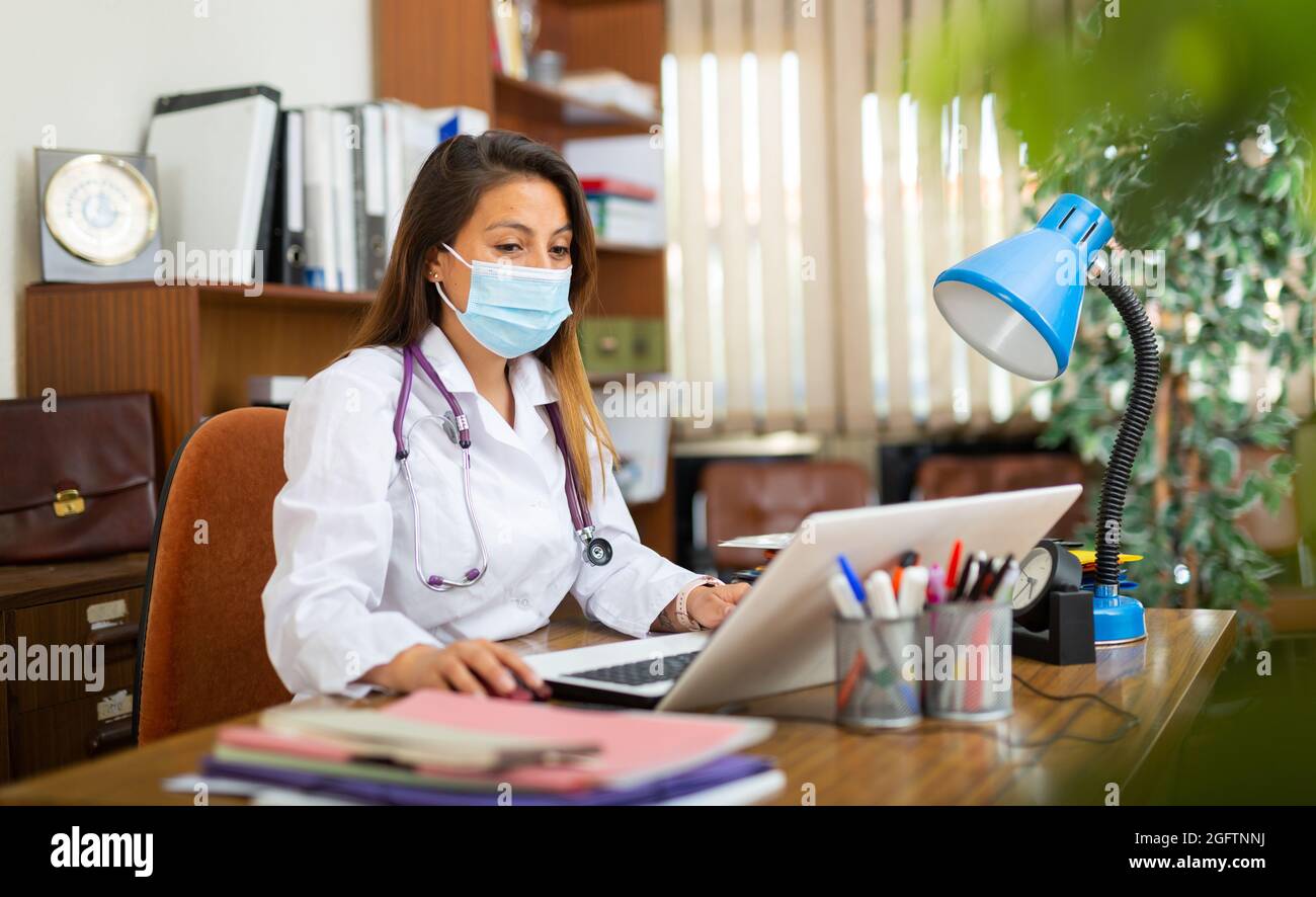 Young mexican doctor sitting hi-res stock photography and images - Alamy
