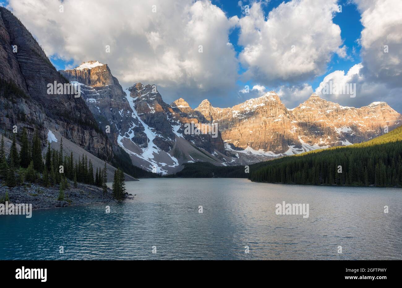 Sunrise at the Moraine lake in Rocky Mountains in Banff National Park, Canada. Stock Photo