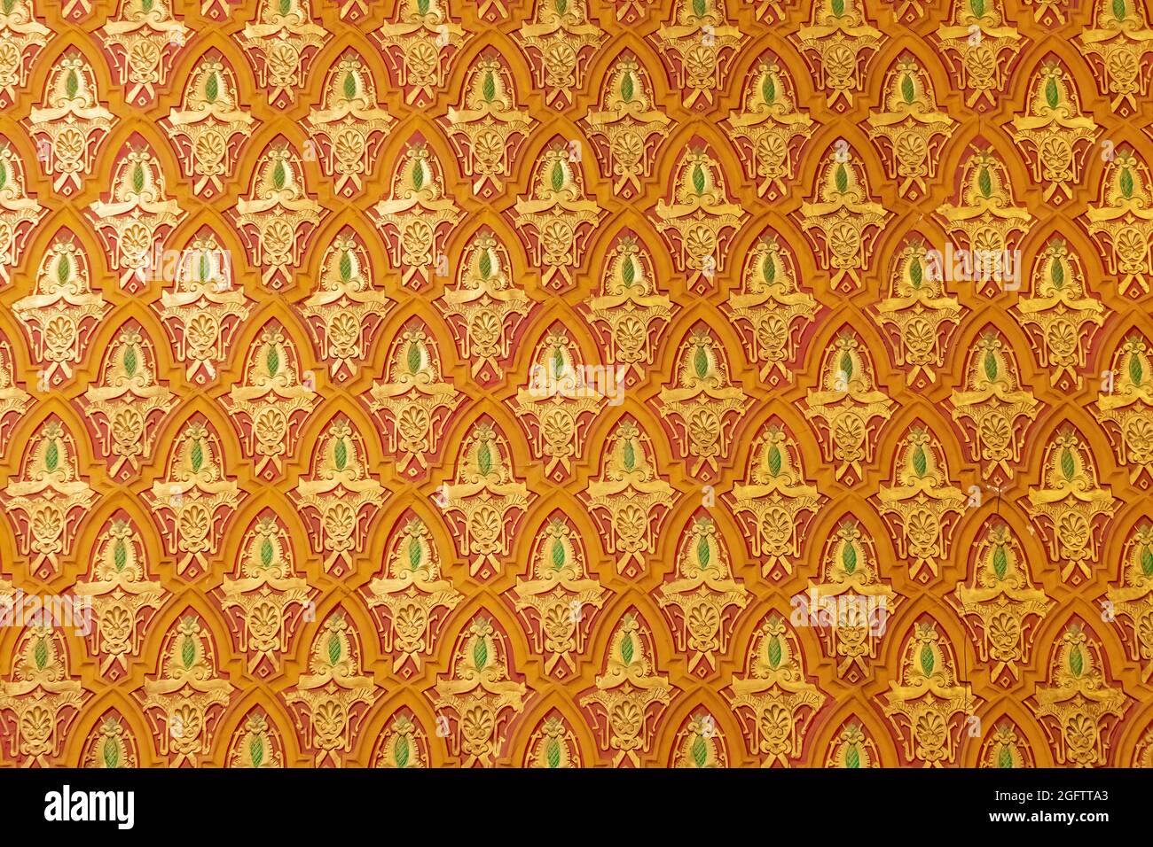 art pattern stucco gold red temple wall background Stock Photo