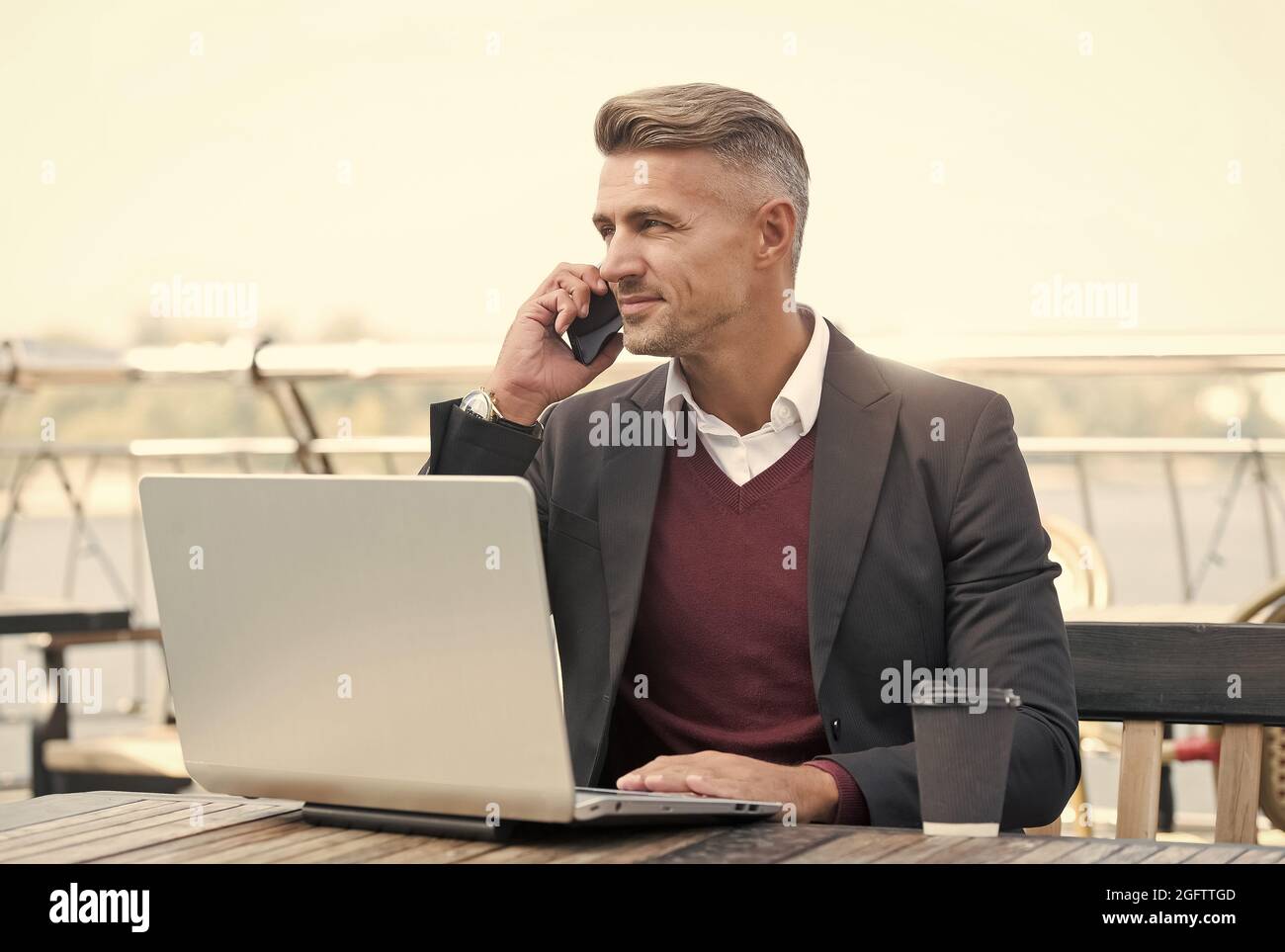 Remote management. Online service manager work in internet cafe. Sales  manager make phone call to client. Running e-business. E-sales. E-commerce  Stock Photo - Alamy