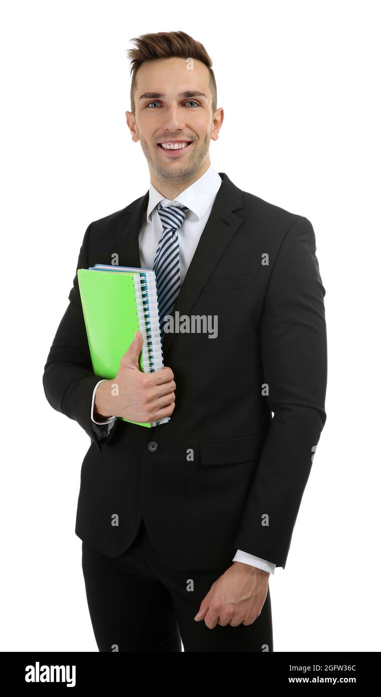 Young teacher with notebooks on white background Stock Photo - Alamy
