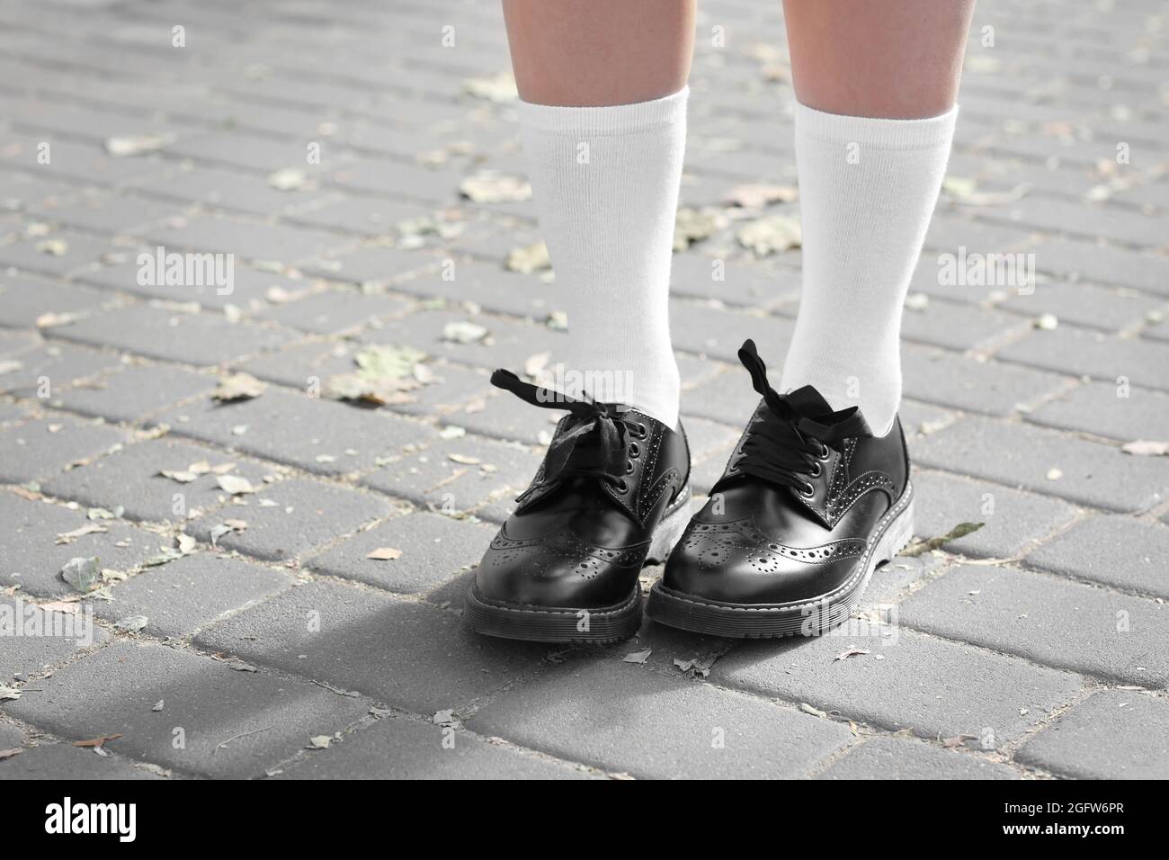 Feet of schoolgirl in uniform outdoors Stock Photo - Alamy