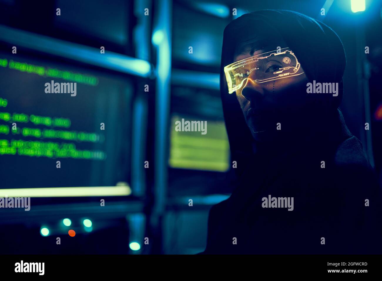 Cyber hacker breaks into databases to obtain information using a computer. Cybercrime and data security concept. Stock Photo