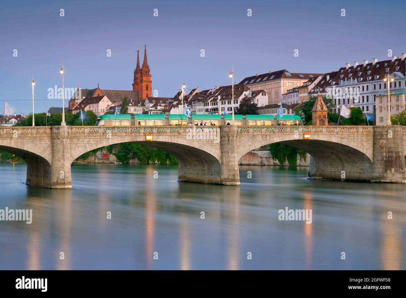 Nightly illuminated old town of Basel with Basel Minster and the Middle Bridge over the Rhine, Switzerland, Bale Stock Photo