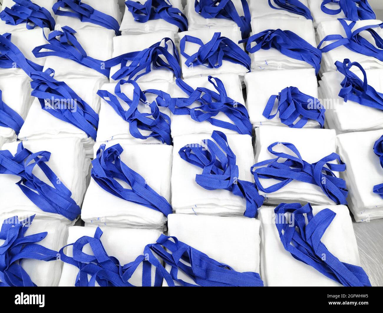 Closeup Image Of Arranged Medical Surgical X Ray Detectable Sponge With Blue String Stock Photo