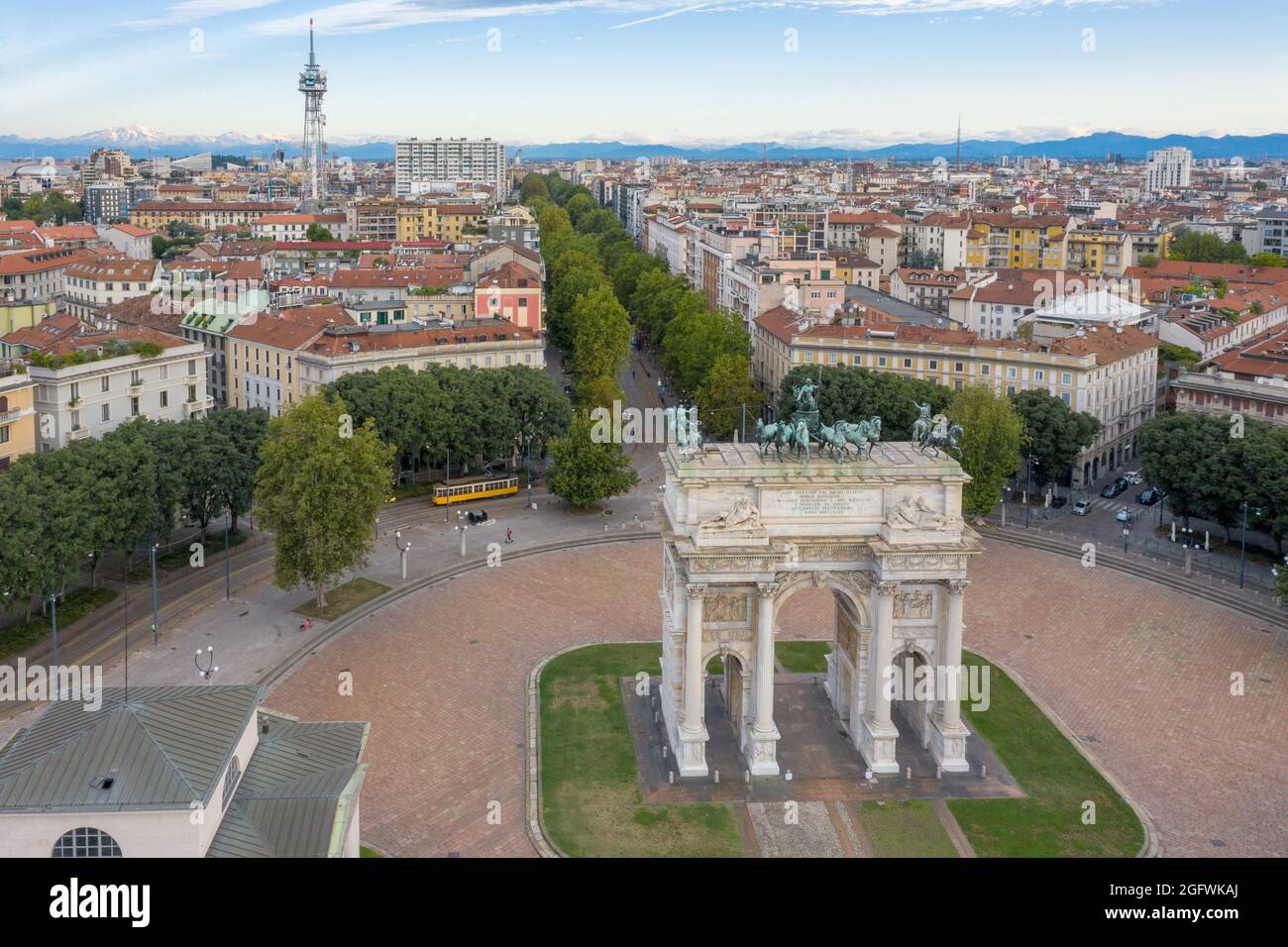 Porta Sempione is a city gate of Milan.  The gate is marked by a landmark triumphal arch called Arco della Pace ('Arch of Peace') Stock Photo