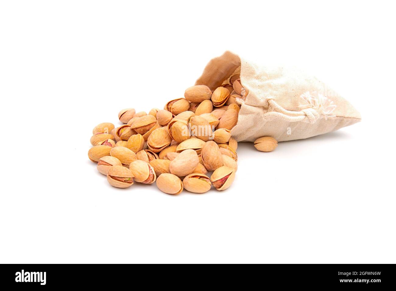 Sack with pistachios in a bag on white background Stock Photo Alamy