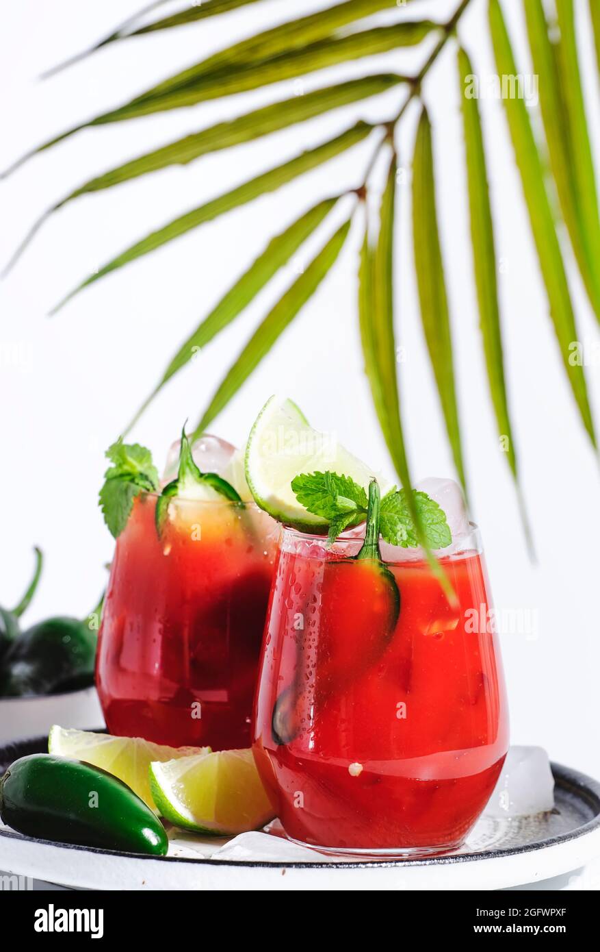 Spicy cocktail with vodka, tomato juice, jalapeno pepper, ice, lime and