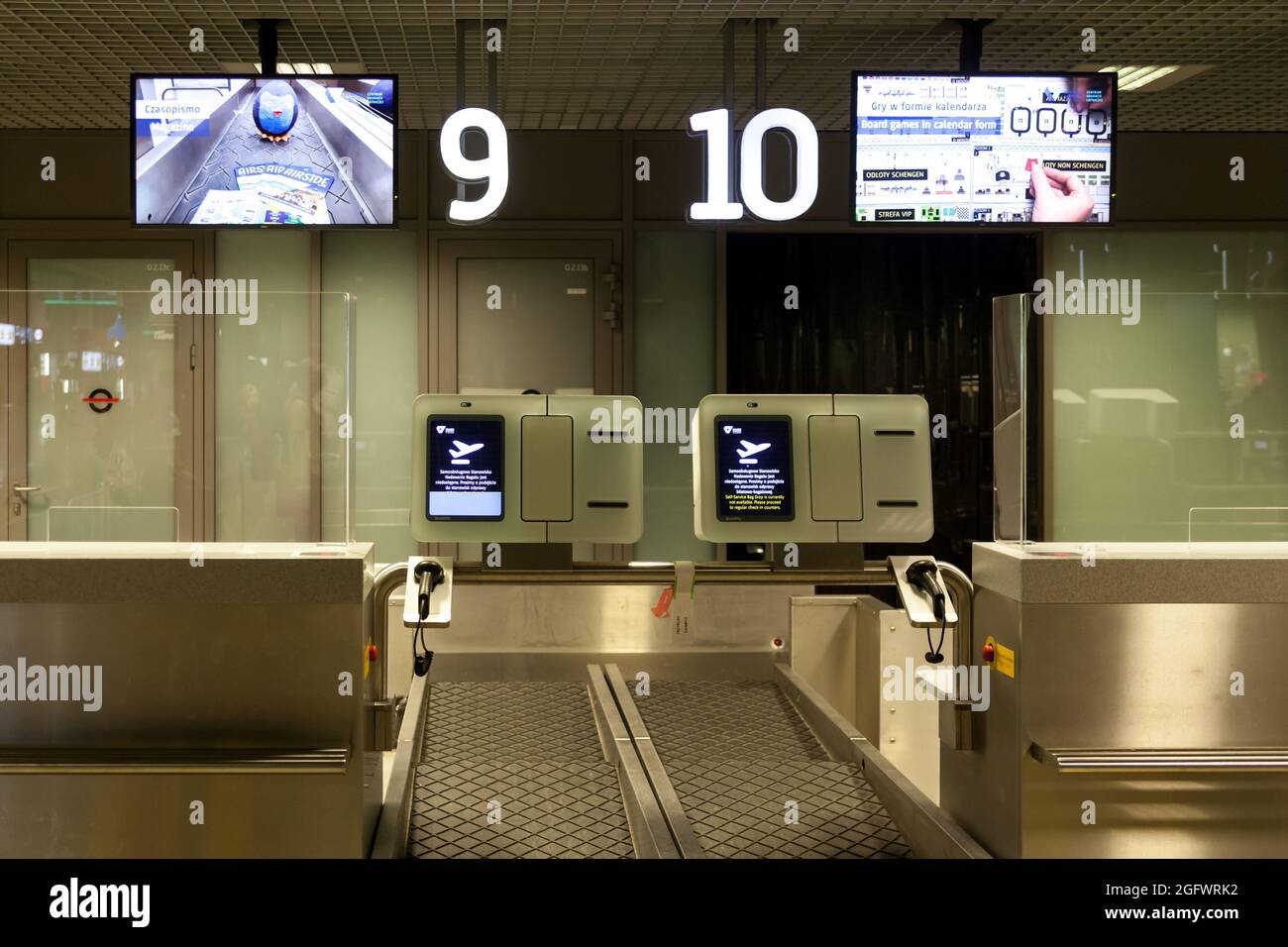 Luggage weighing platforms in main terminal. Krakow John Paul II