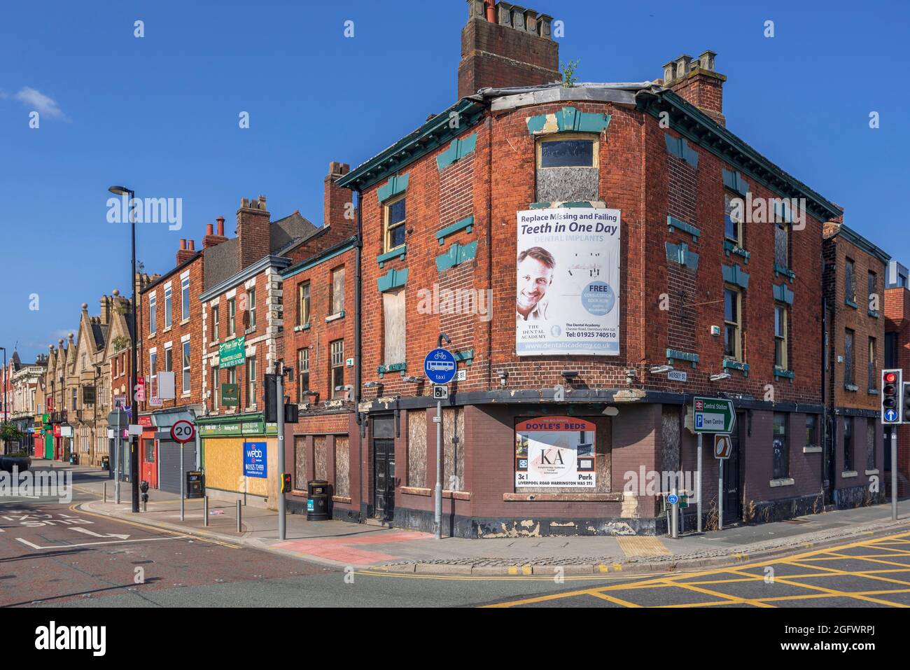 Closed and shuttered haigh street in Warrington. Stock Photo