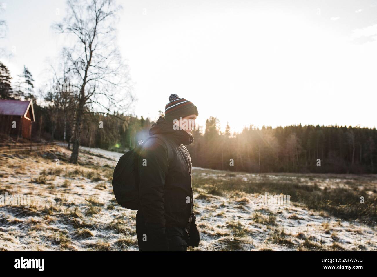 Back view of man walking hi-res stock photography and images - Alamy