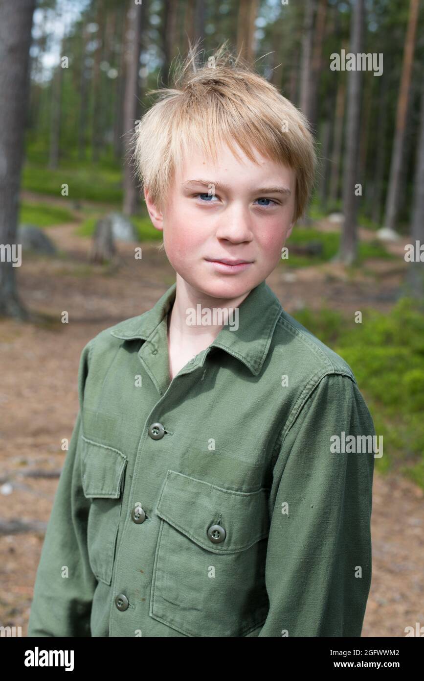 Portrait of boy looking at camera Stock Photo - Alamy