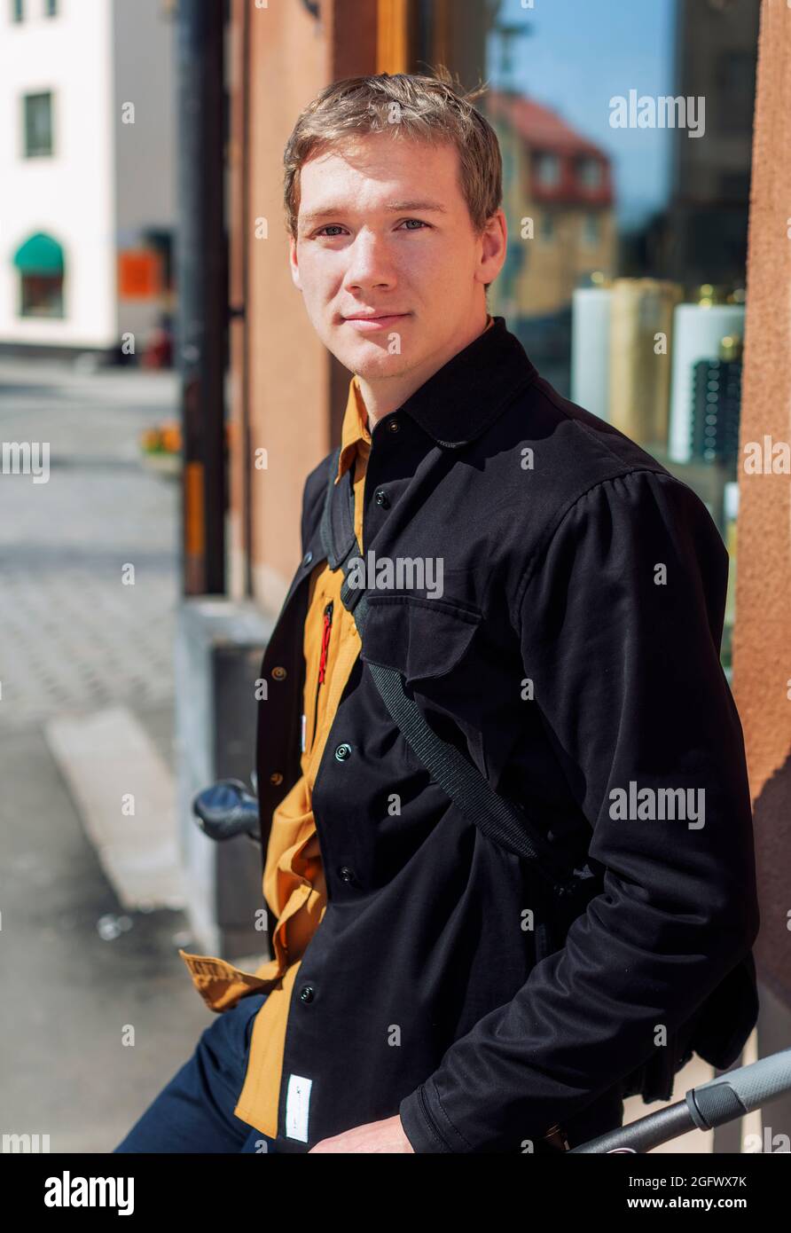 Smiling man looking at camera Stock Photo - Alamy