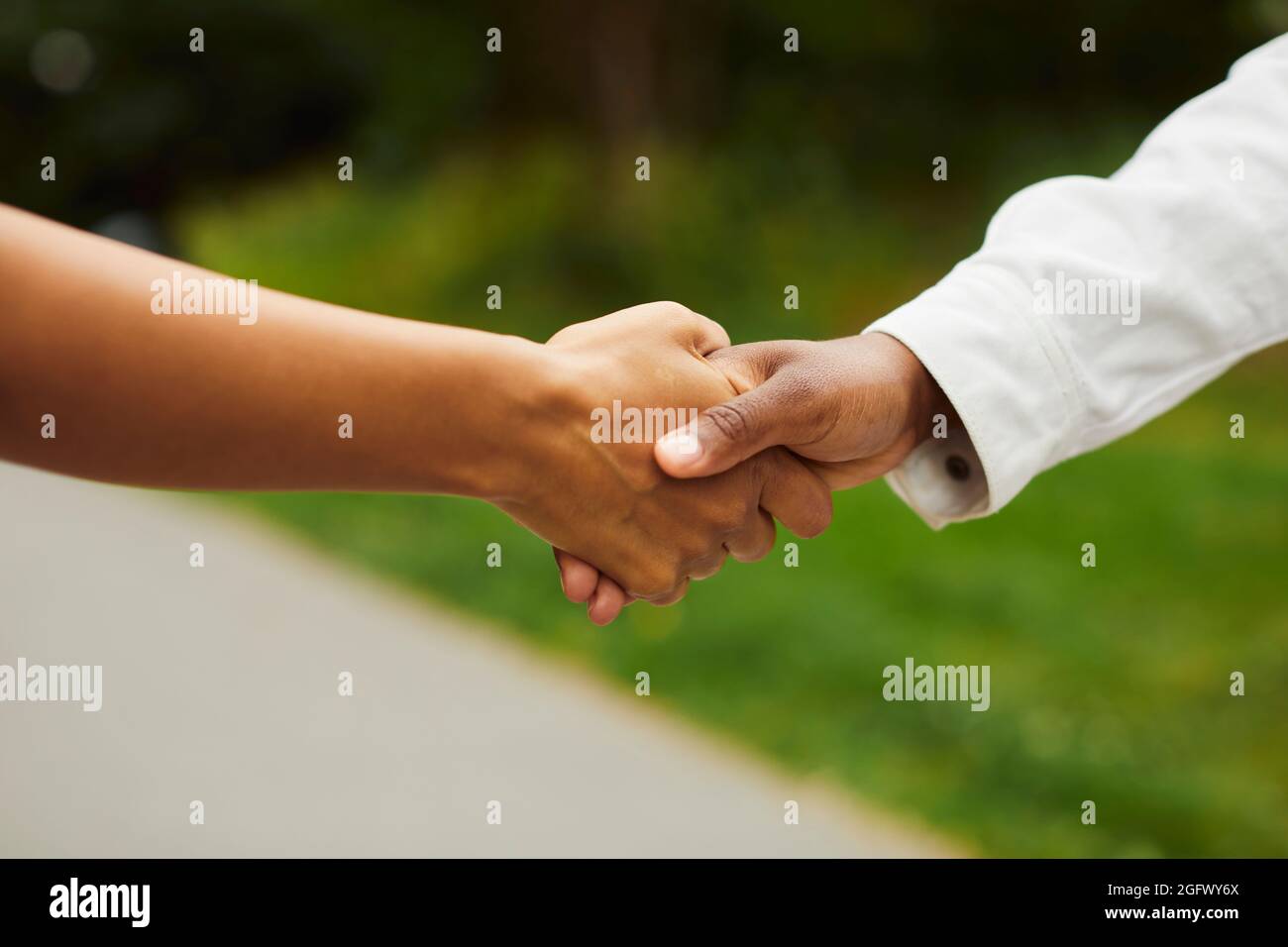 Close-up of people holding hands Stock Photo - Alamy