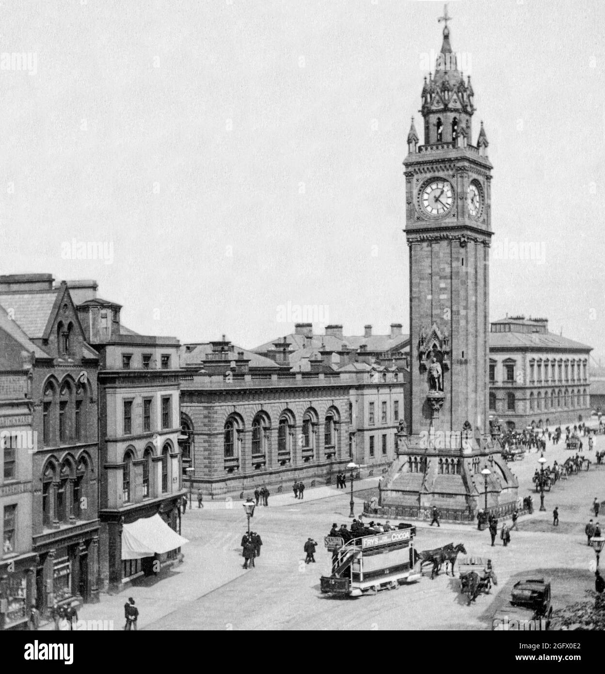 An early 20th century  view of High Street and the Albert Memorial Clock (more commonly referred to as the Albert Clock) situated at Queen's Square in Belfast, Northern Ireland. It was completed in 1869 and is one of the best known landmarks of Belfast. Stock Photo