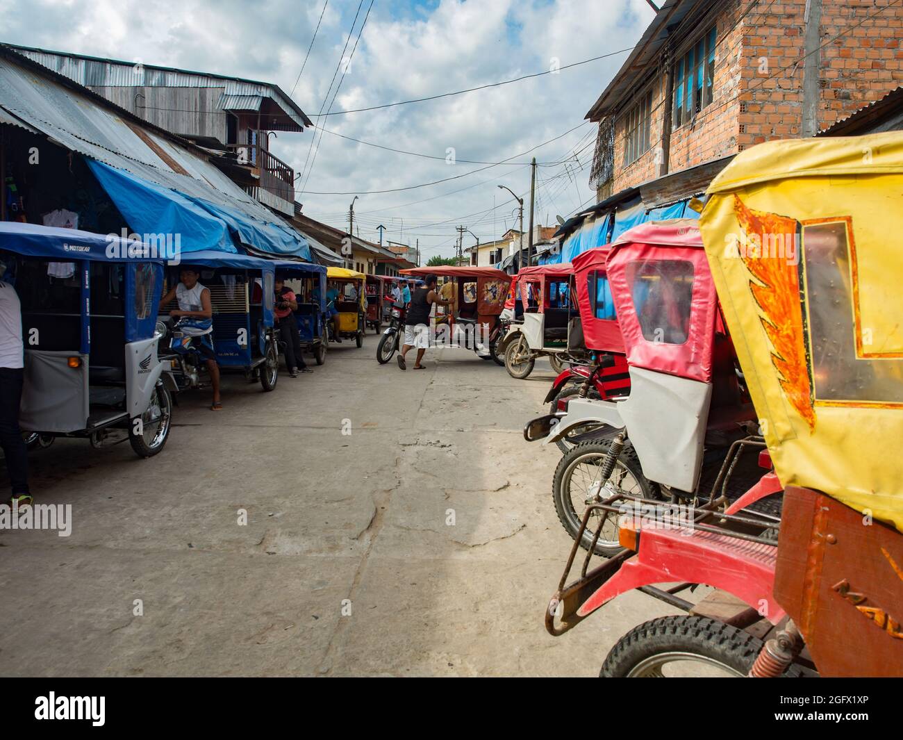 Caballococha, Peru - Dec, 2017:: Colorful rickshaws wait for passengers ...
