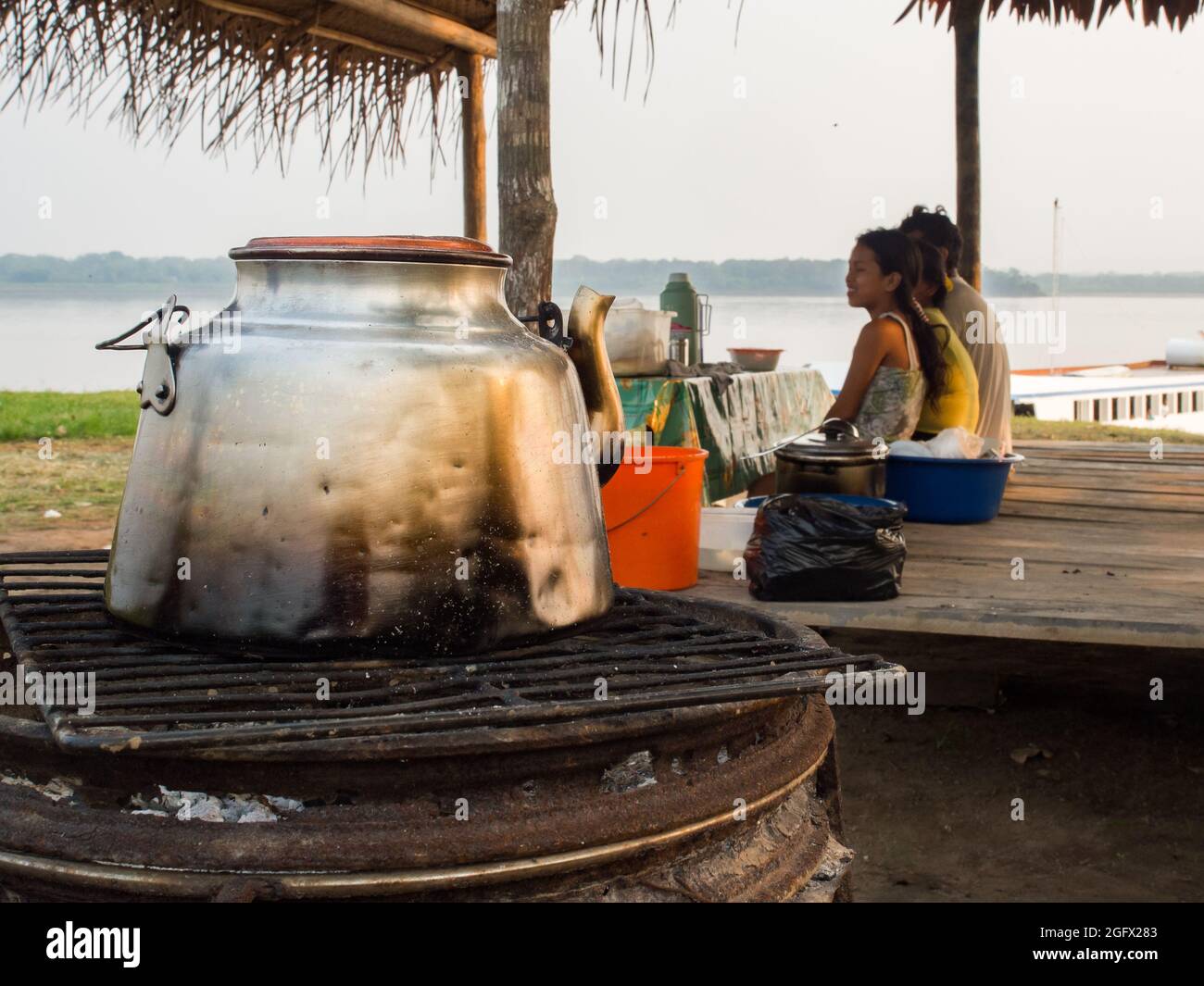 Tapioka Village, Peru - Sep , 2017: Cooking on the fireplece in the port at Amzoin River in the amazons jungle. Amazonia. Brazil. South America. Stock Photo