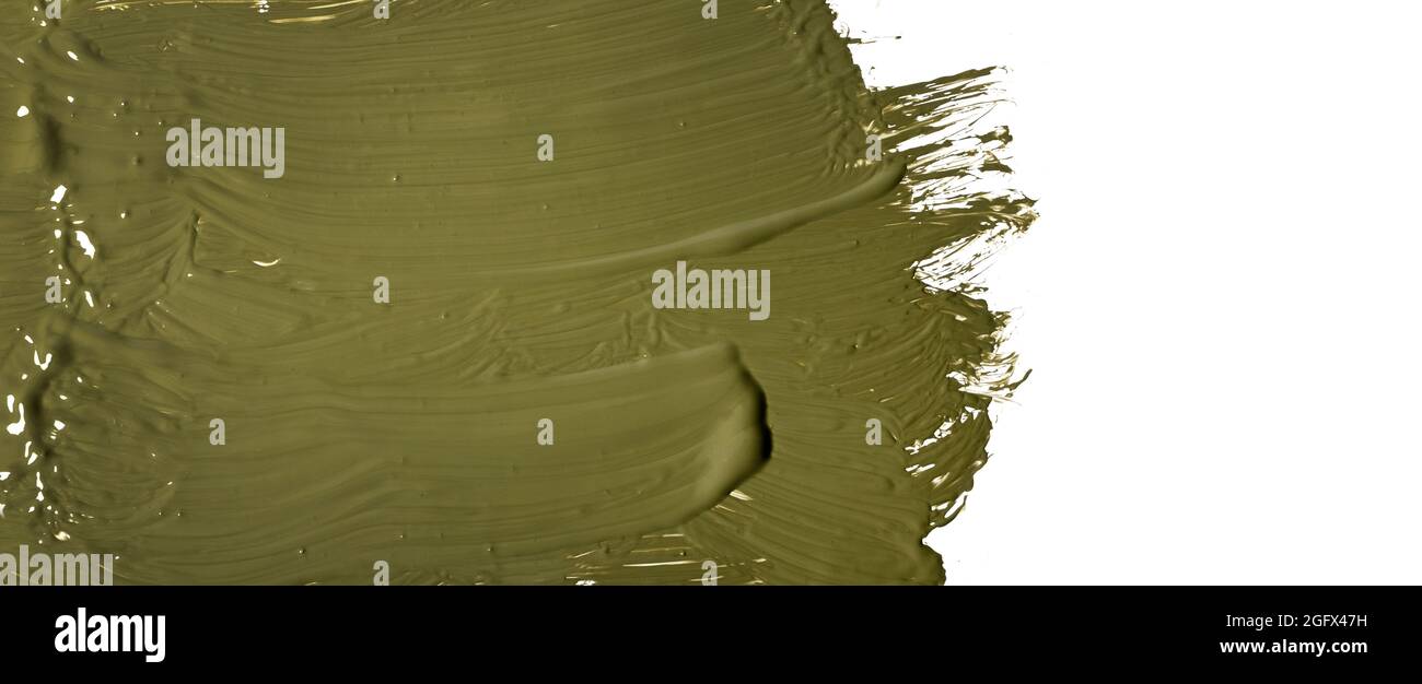 khaki green paint brush stroke on white background. banner copy space Stock Photo