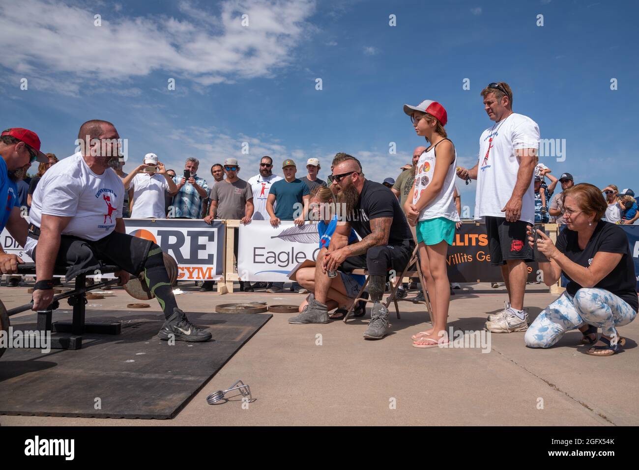 Adaptive athlete Assaf Dory, an above-the-knee amputee, competes in seated deadlift at the Crown Mountain Strongman, Carbondale, Colorado, USA.. Stock Photo