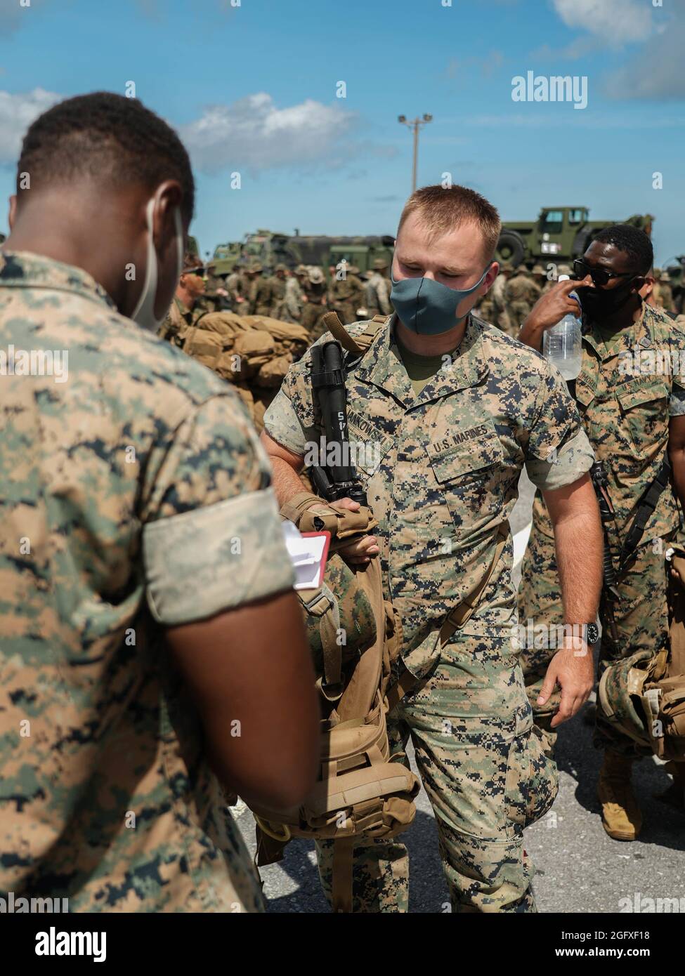 U.S. Marine Corps Lance Cpl. Jarod Jankowski, a landing support specialist with Combat Logistics Regiment 3, 3d Marine Logistics Group, and Chicago, Illinois, native, weighs in during an integrated rapid response inspection at Kadena Air Base, Okinawa, Japan, August 25, 2021. Routine short-notice inspections ensure III MEF Marines remain ready to rapidly deploy and maintain regional security in the Indo-Pacific. 3d MLG, based out of Okinawa, Japan, is a forward deployed combat unit that serves as III Marine Expeditionary Force’s comprehensive logistics and combat service support backbone for o Stock Photo