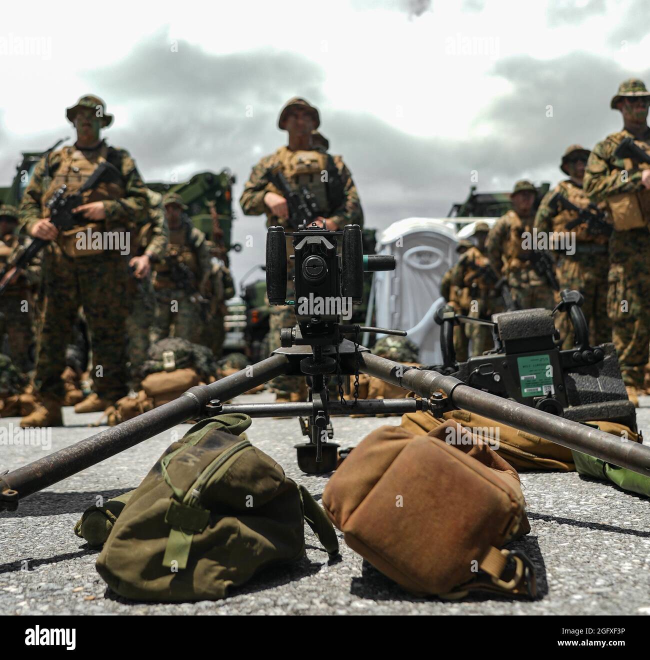 U.S. Marines with Combat Logistics Battalion 4, 3d Marine Logistics Group, and 2d Battalion, 3d Marines, 3d Marine Division, stage an M2 during an integrated rapid response inspection at Kadena Air Base, Okinawa, Japan, August 25, 2021. Routine short-notice inspections ensure III MEF Marines remain ready to rapidly deploy and maintain regional security in the Indo-Pacific. 3d MLG, based out of Okinawa, Japan, is a forward deployed combat unit that serves as III Marine Expeditionary Force’s comprehensive logistics and combat service support backbone for operations throughout the Indo-Pacific ar Stock Photo