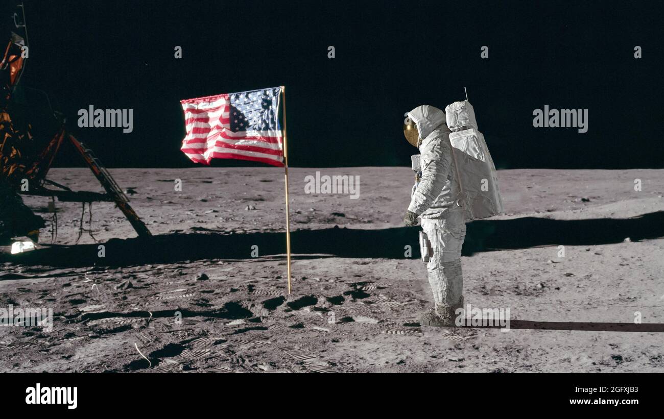 Astronaut saluting american flag moon hi-res stock photography and ...