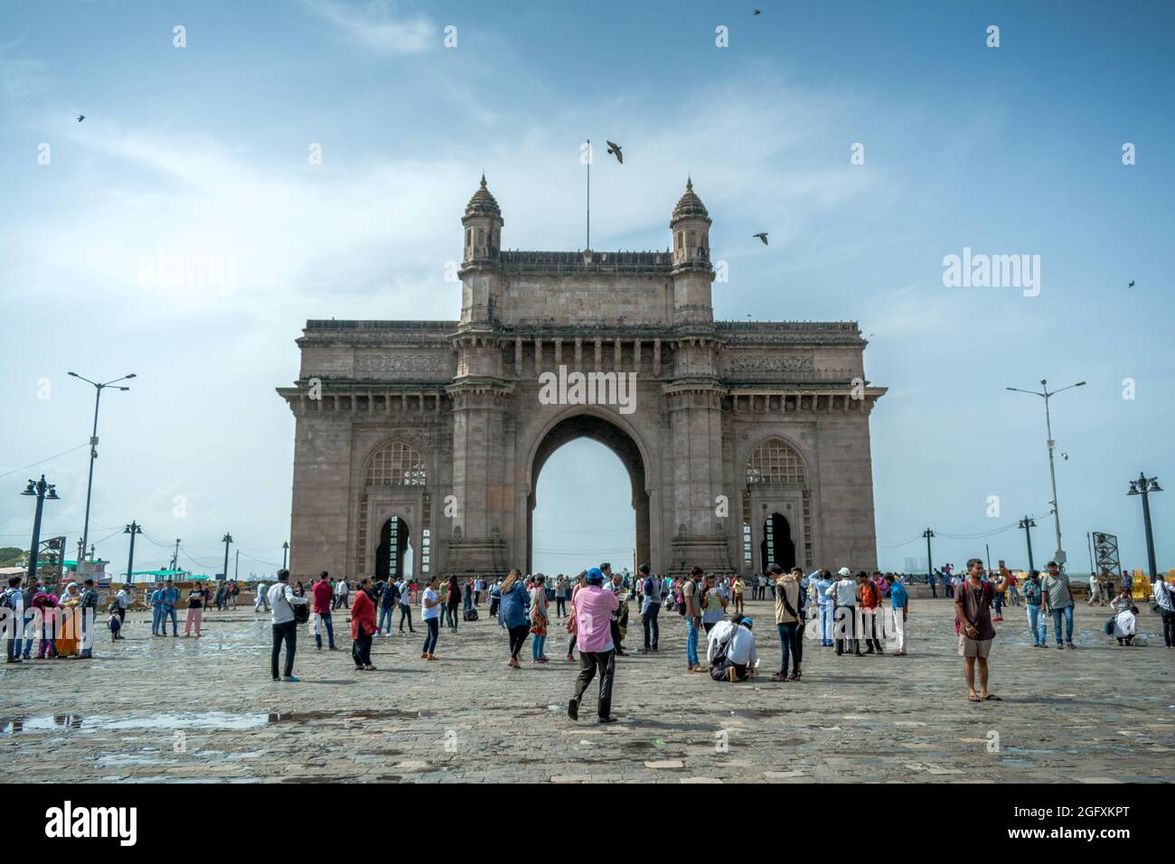 Mumbai, Maharastra, India - Jul 14 2019: People at the iconic Gateway of India, a symbol of the heritage of Mumbai, India Stock Photo