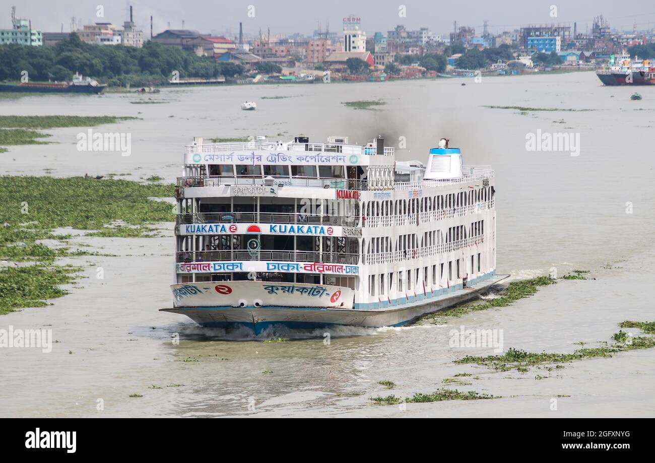 Local Passenger ferry returning to Dhaka river port. Ferry is a very important means of communication with the southern part of Bangladesh Stock Photo