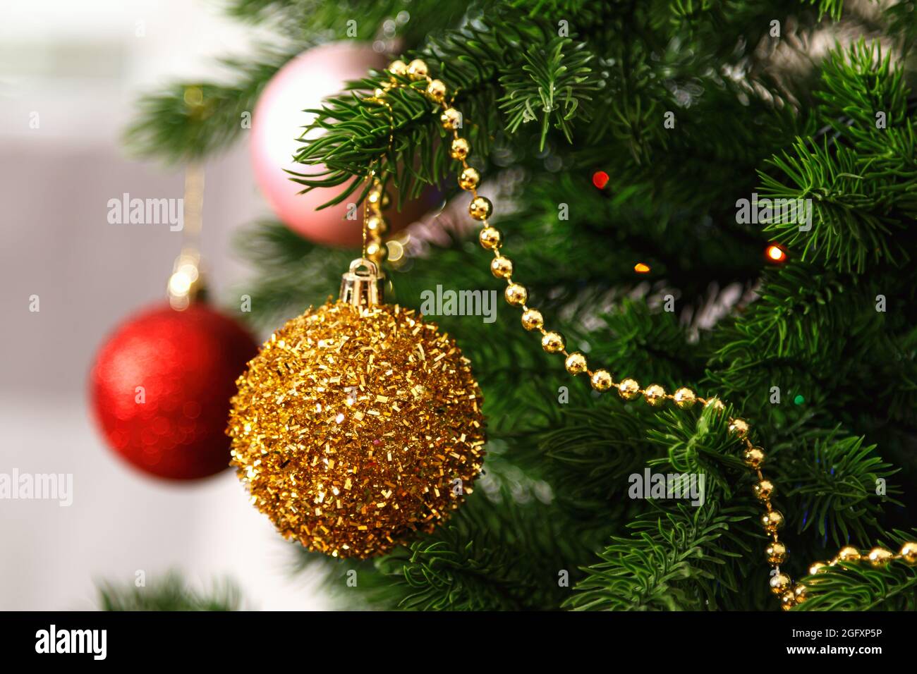 White christmas tree green balls hi-res stock photography and