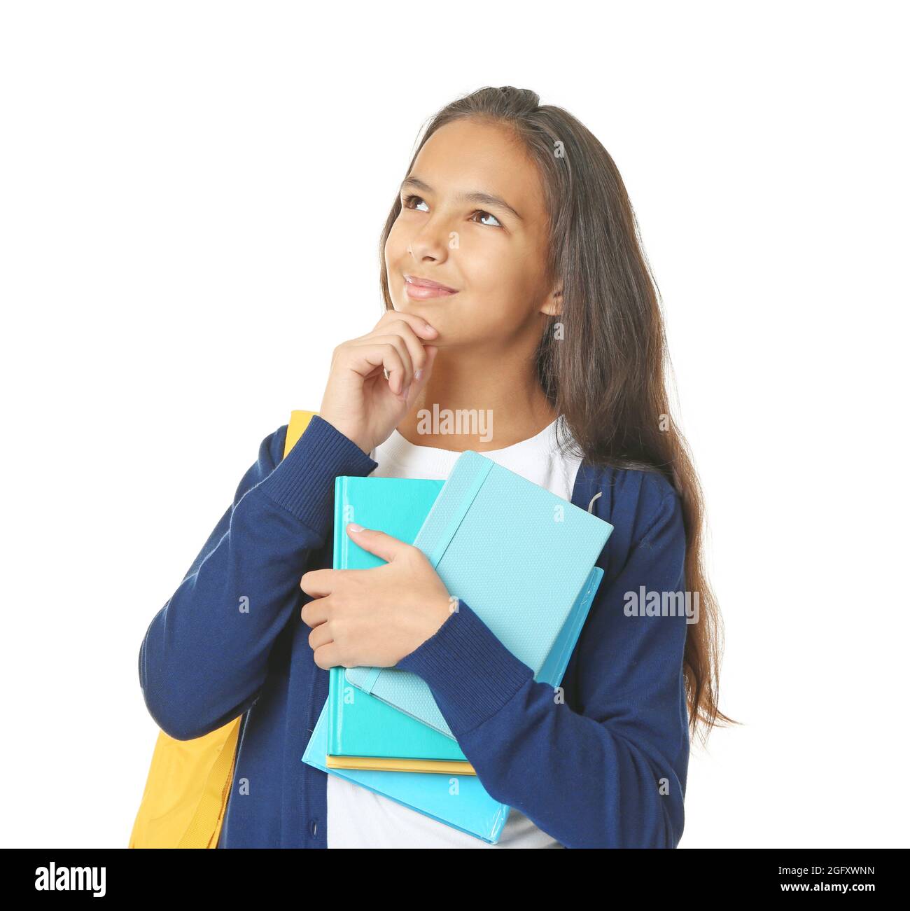 Cute schoolgirl with books on white background Stock Photo - Alamy