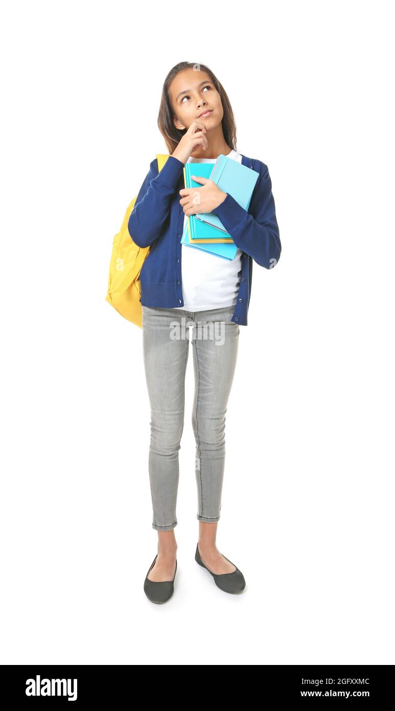 Cute schoolgirl with books on white background Stock Photo - Alamy