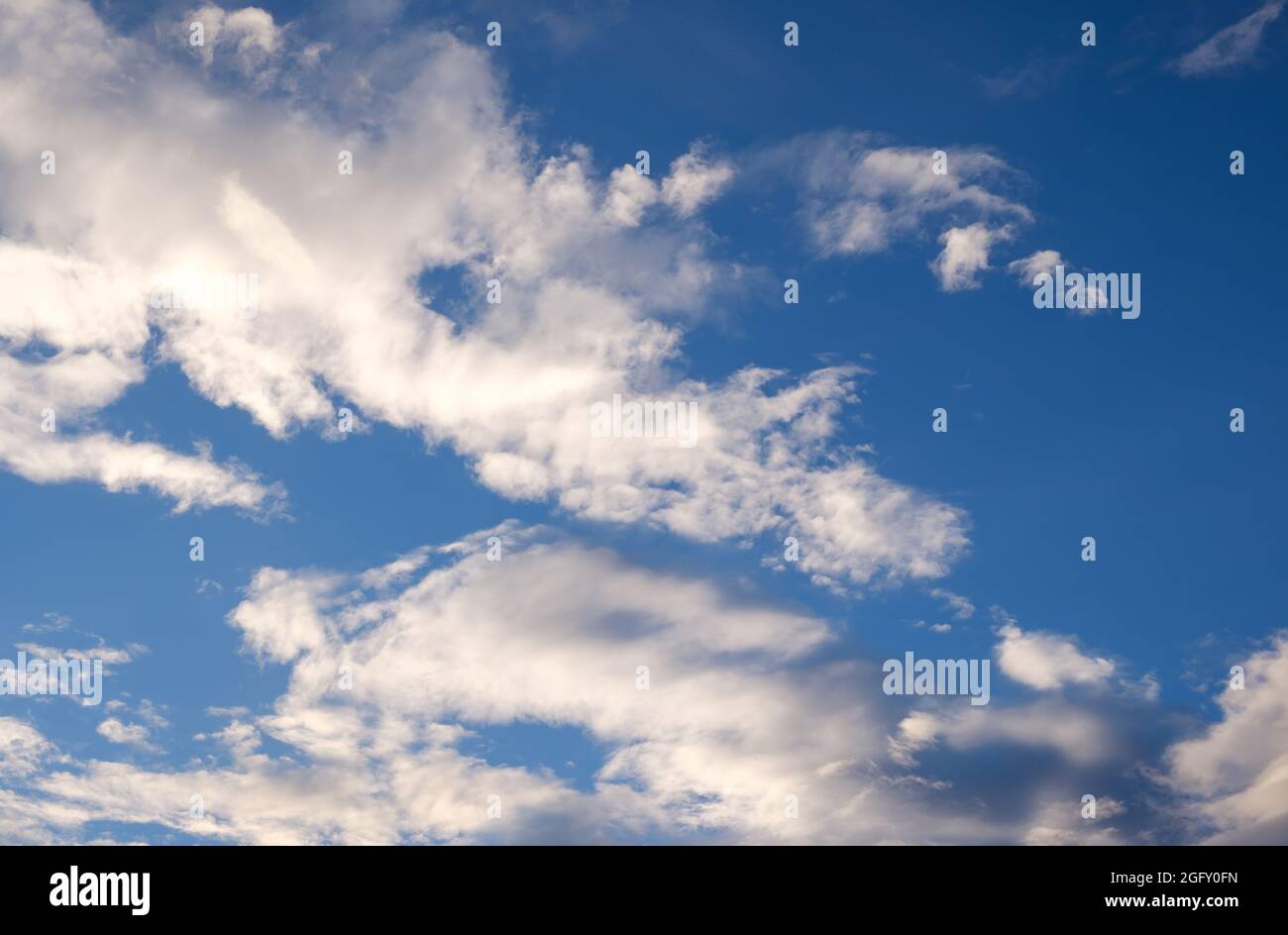 White clouds on a deep blue sky in summer Stock Photo