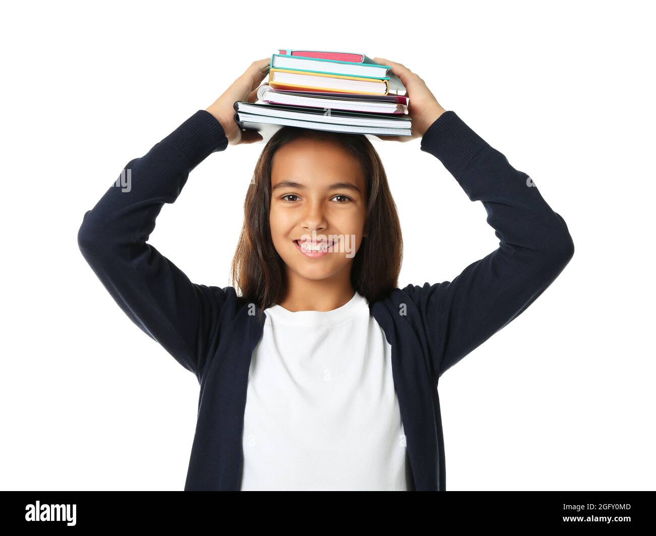 Cute schoolgirl with books and notepads on white background Stock Photo ...