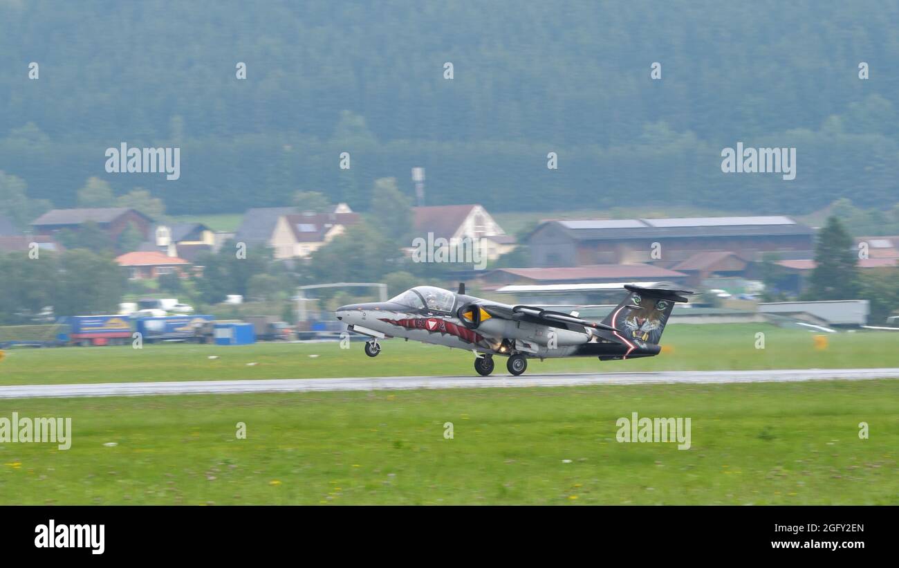 Zeltweg, Austria SEPTEMBER, 6, 2019 Military plane landing in an airport in the Alps. SAAB 105 of Austrian Air Force Stock Photo