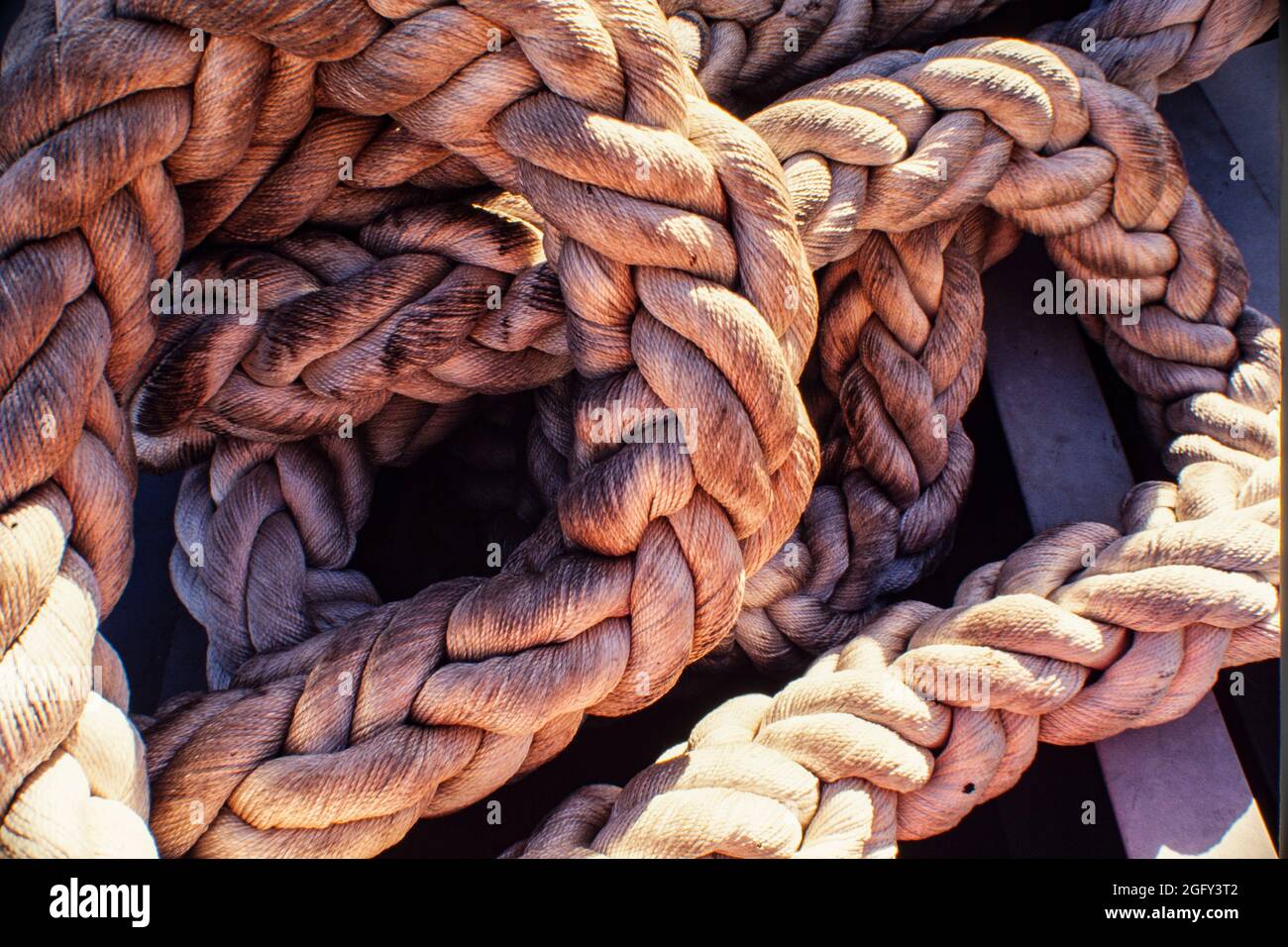 Very thick rope used at oil platform. Stock Photo