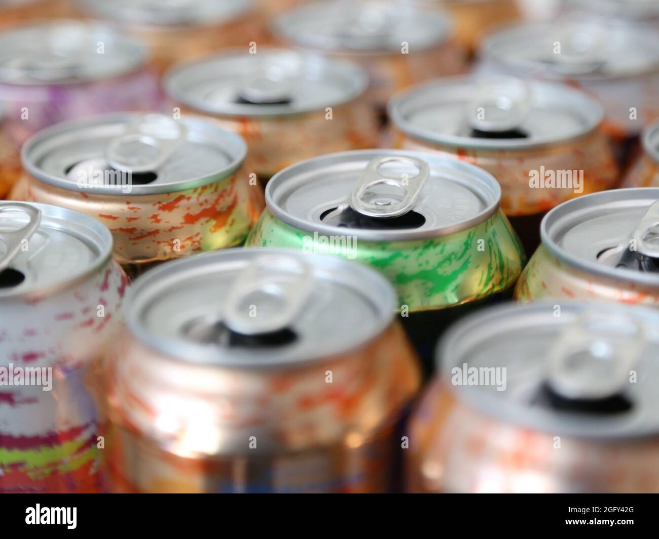 Opened La Croix carbonated / sparkling water cans are shown up close from an overhead view. For editorial uses only. Stock Photo