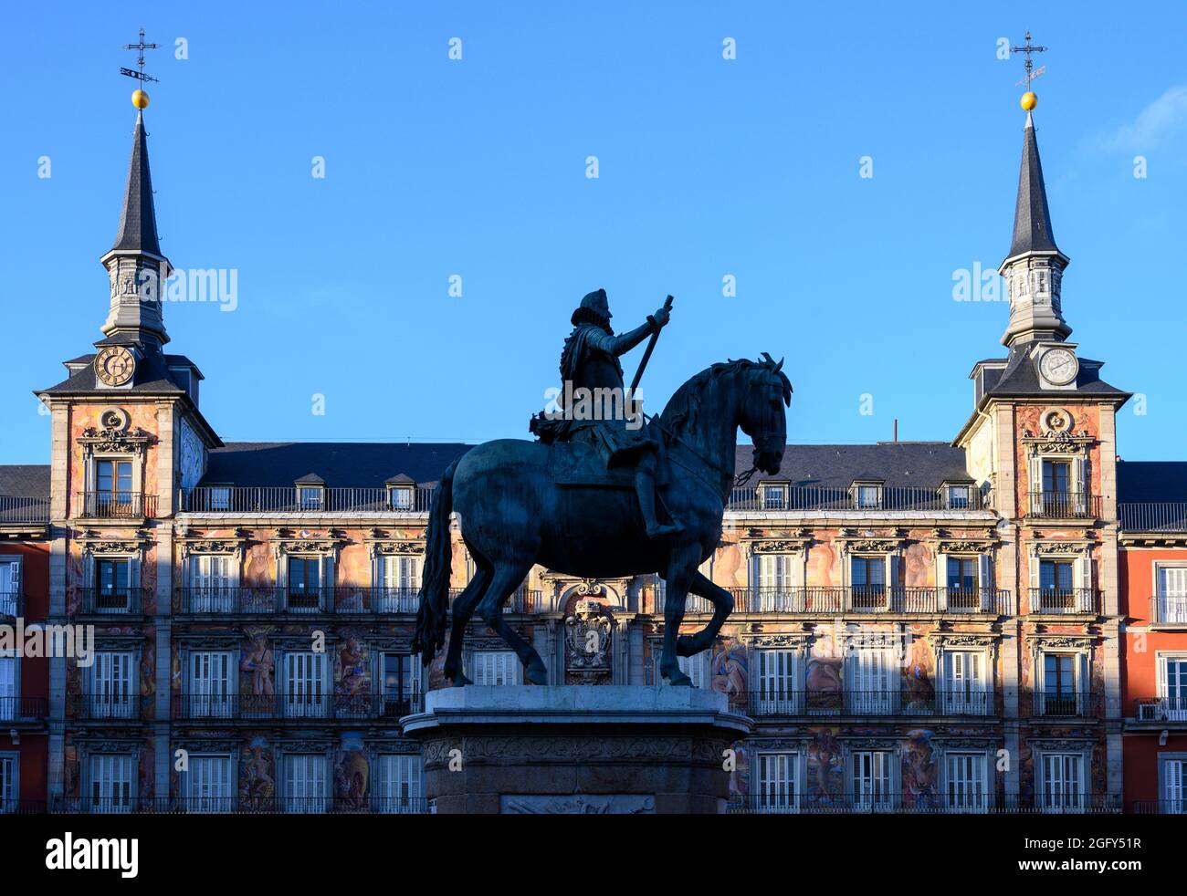 Equestrian statue of Philip III with the Casa de la Panaderia in the background in the Plaza Mayor, central Madrid, Spain. Stock Photo