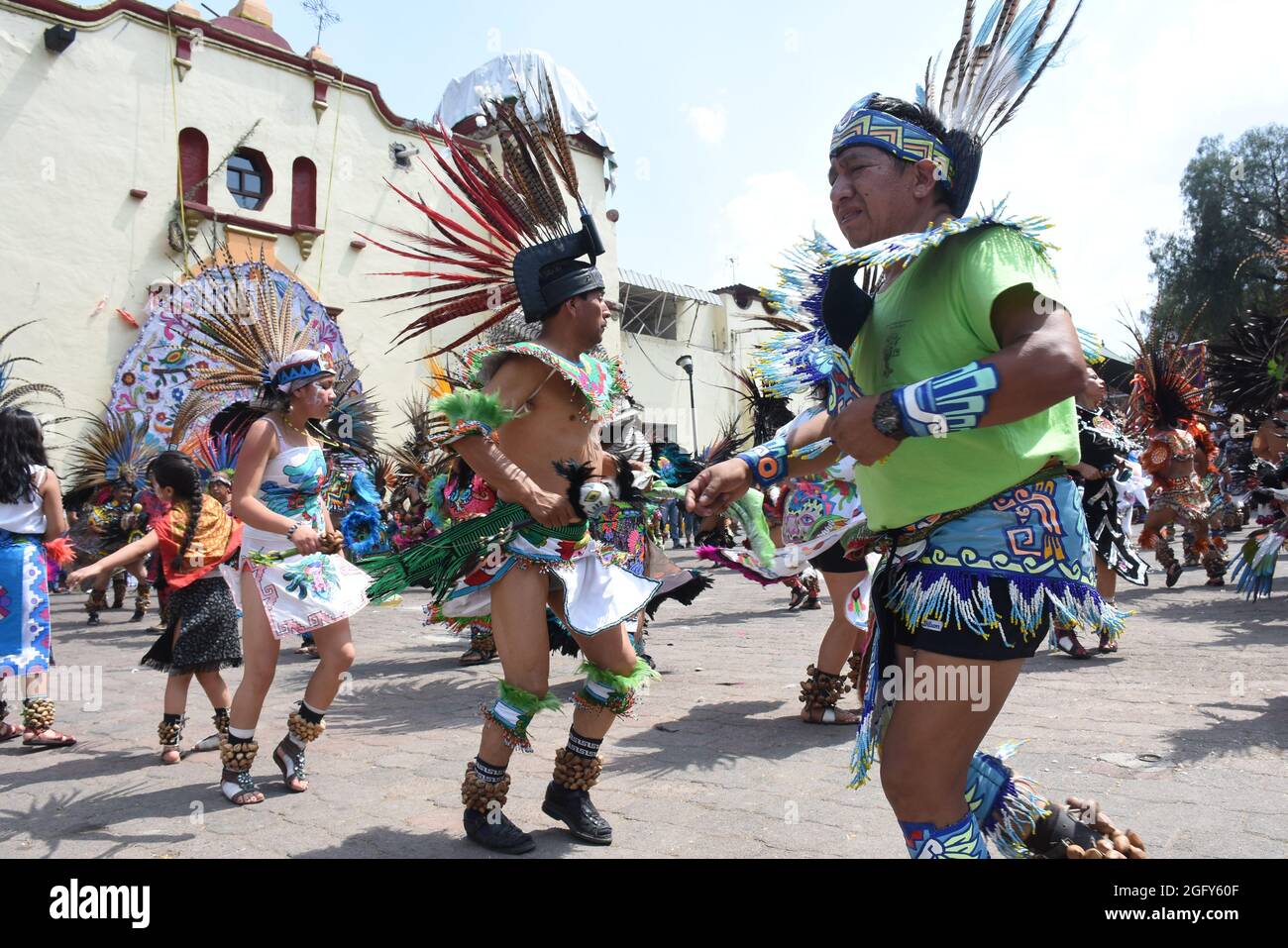 Aztec dancers celebrate the feast day of San Gregorio, the patron saint ...
