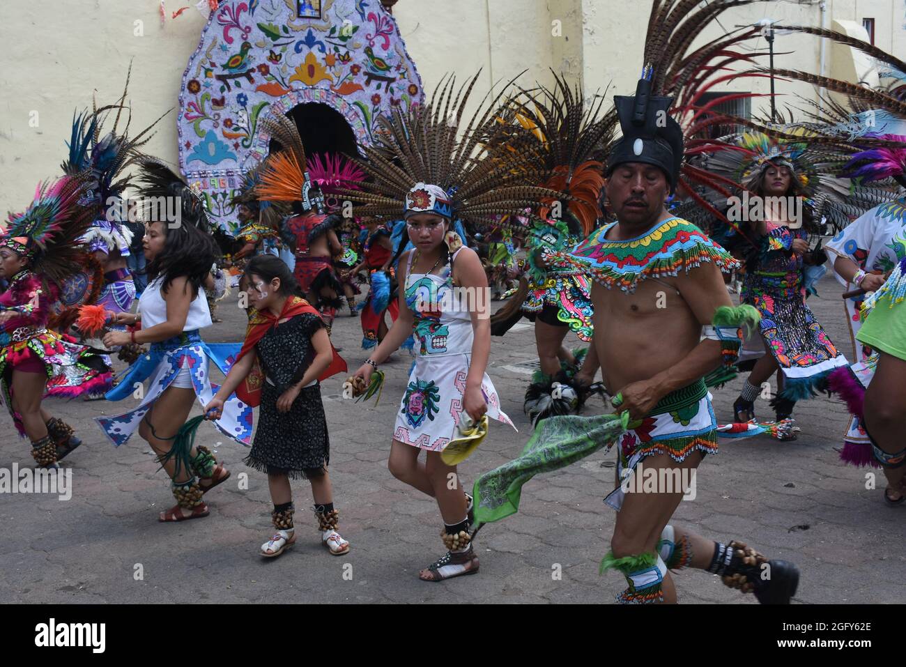 Aztec dancers celebrate the feast day of San Gregorio, the patron saint ...