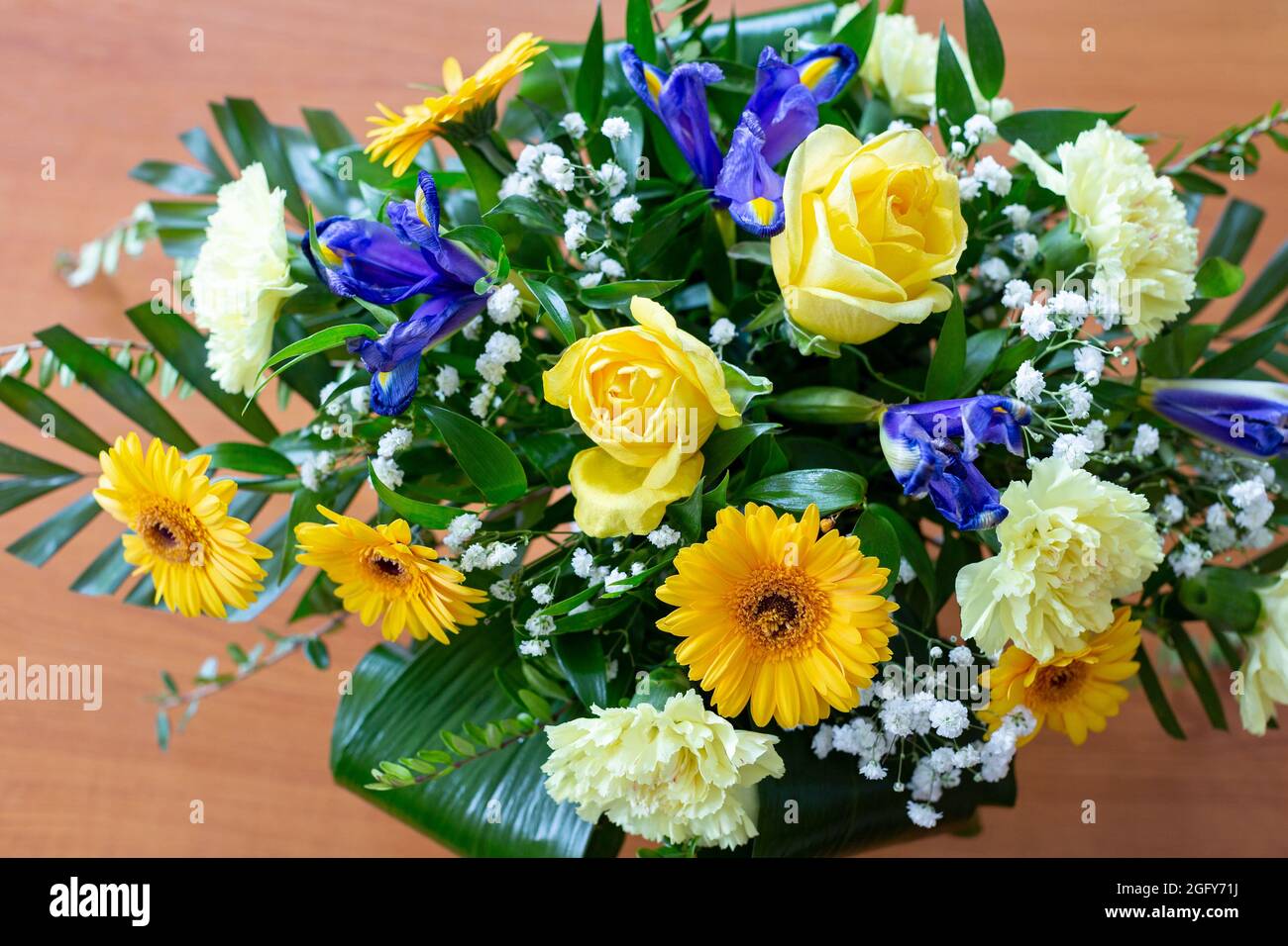 Yellow and blue flower arrangement. Selective focus. Stock Photo
