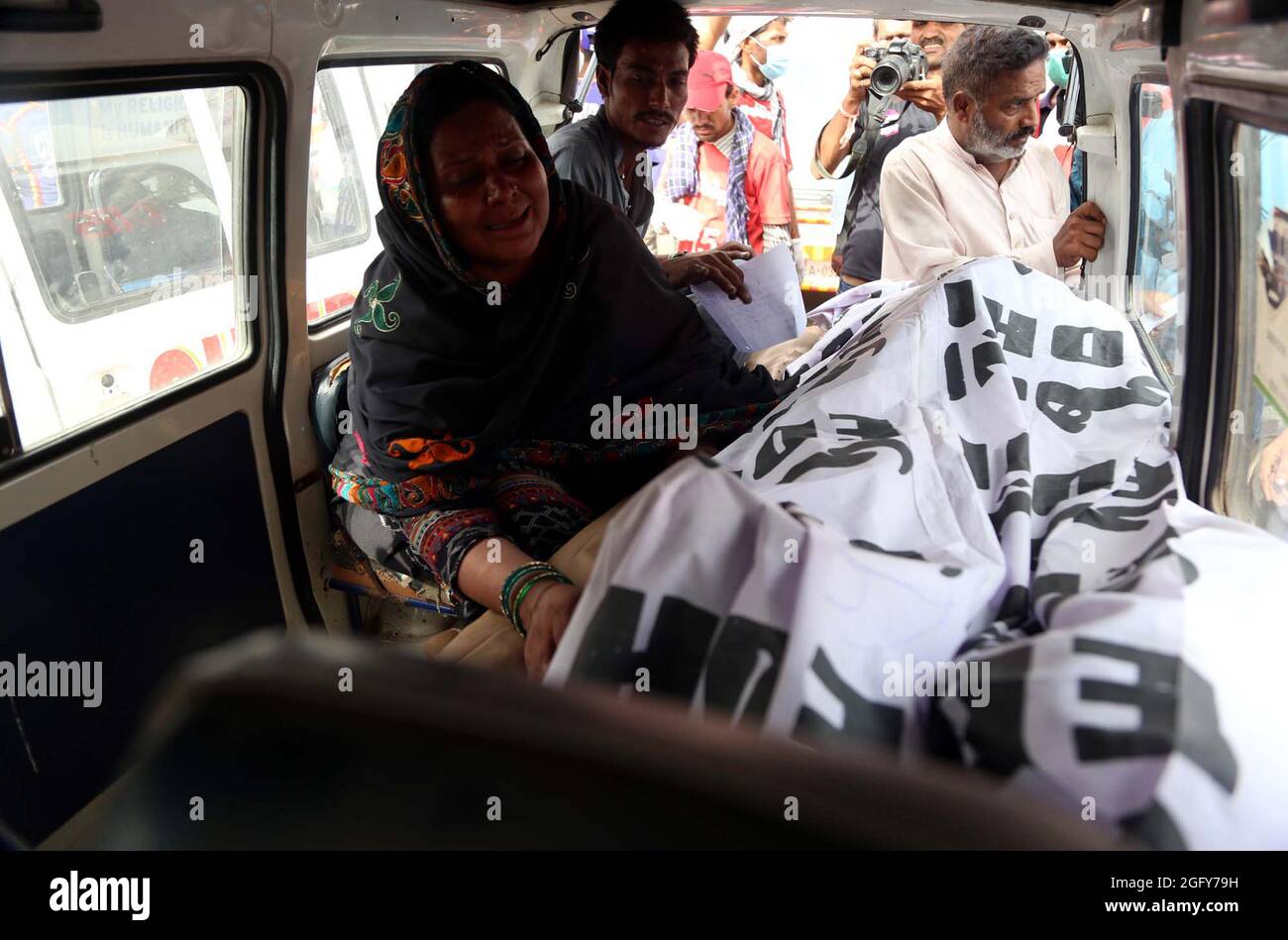 Dead bodies of Chemical factory incident are being shifted to the Jinnah Hospital in Karachi on Friday, August 27, 2021. At least 16 people died after a fire broke out at a factory in Karachi's Mehran Town. Stock Photo
