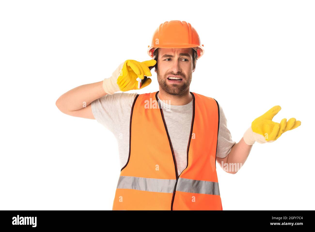 Confused builder talking on smartphone isolated on white Stock Photo ...