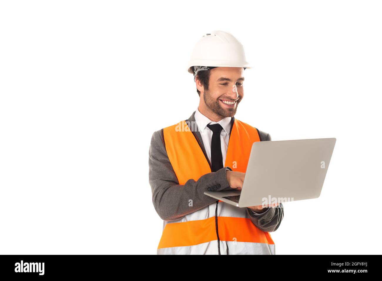 Smiling architect using laptop isolated on white Stock Photo