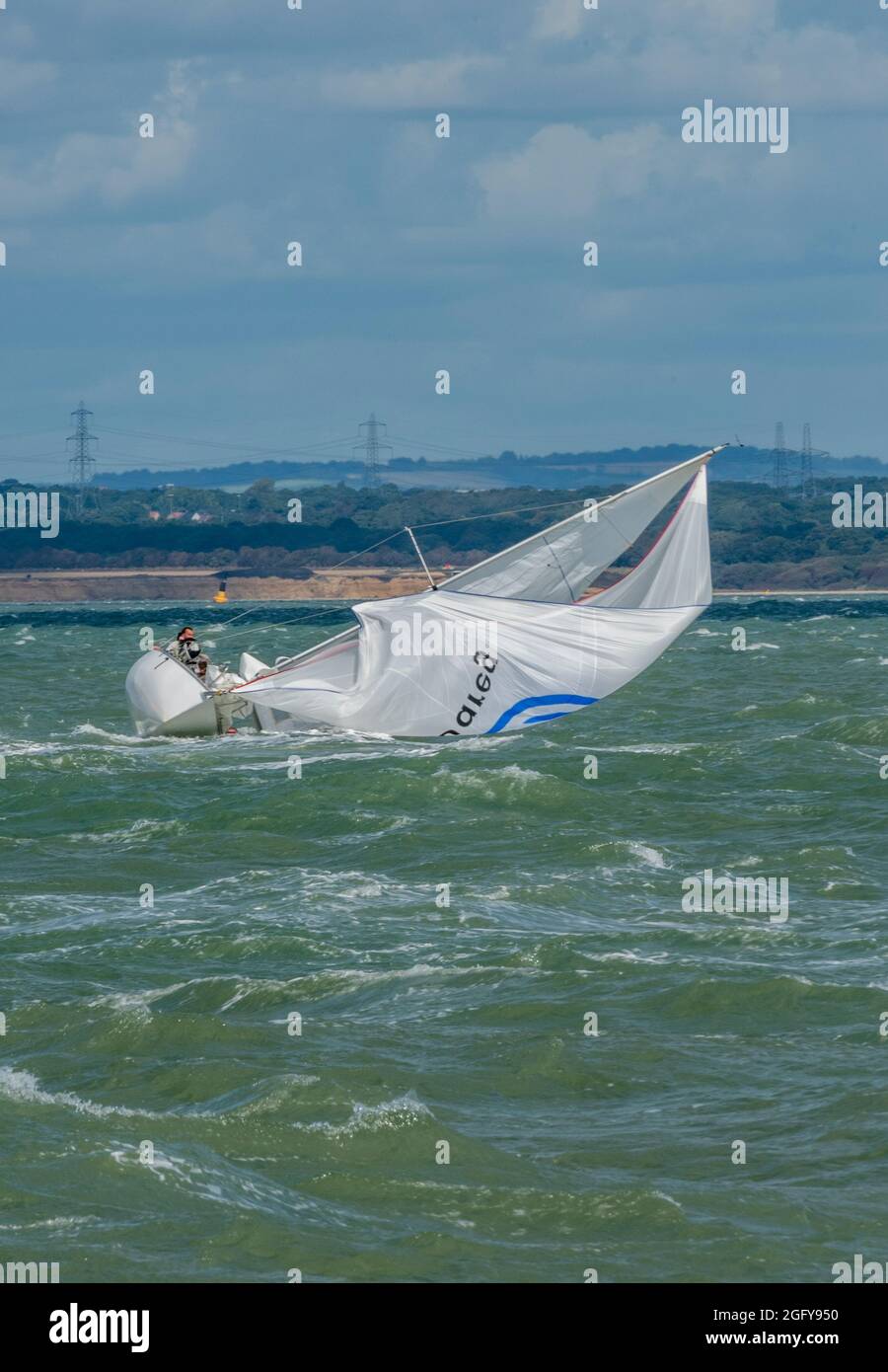 yacht broaching in high wind, yacht in trouble, yacht capsizing, yachtsmen capsized, troubles