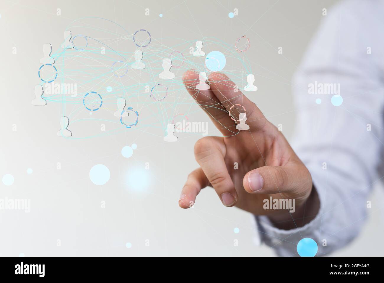 Person's hand touching 3D rendered people silhouettes Stock Photo - Alamy