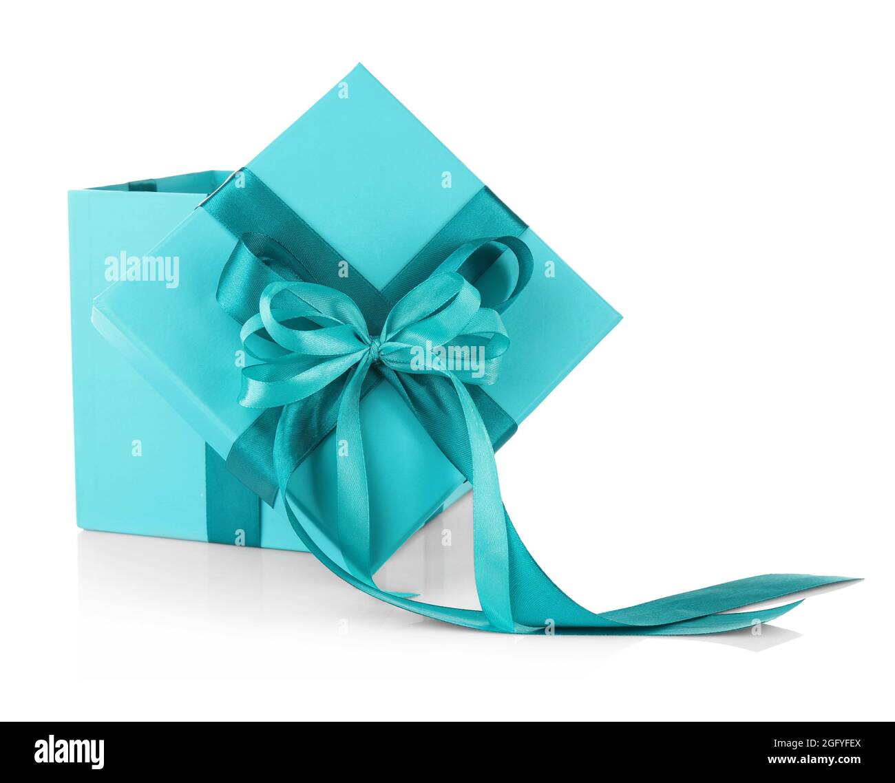 Gift box with ribbon bow on white background Stock Photo - Alamy