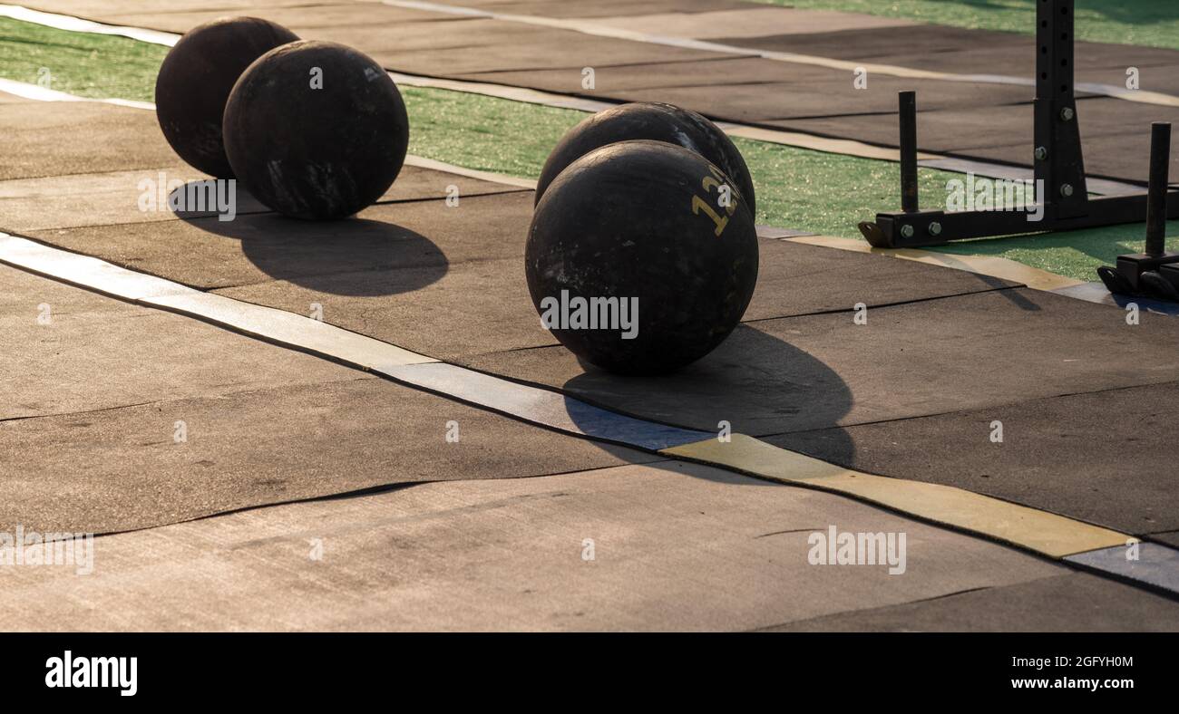 120 kilograms balls on the floor for strongest man competition Stock Photo