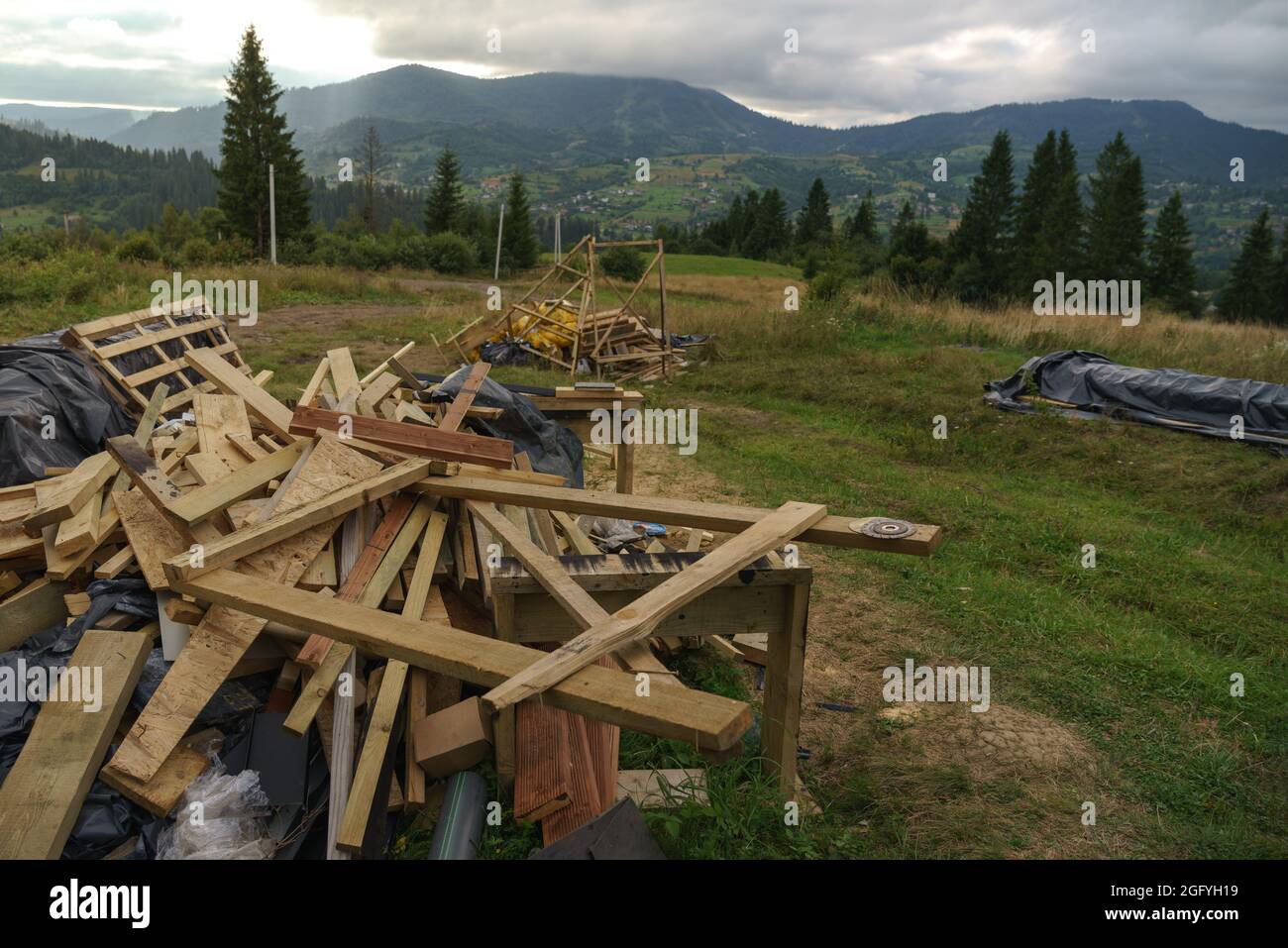 Construction wood waste on Carpathian mountains in Ukraine Stock Photo